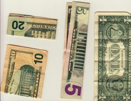 US Dollar bills folded for blind people