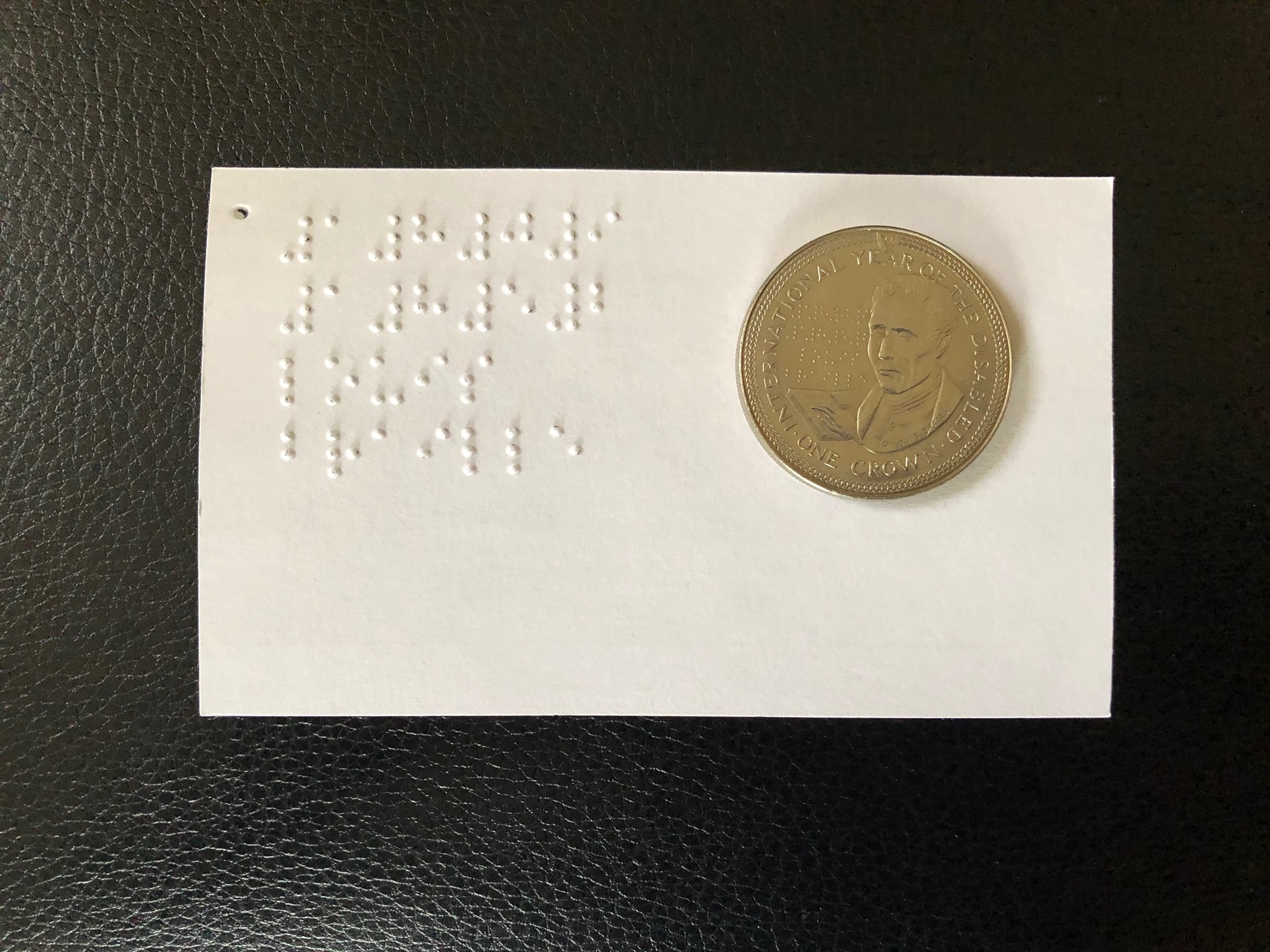 Isle of Man 1 Crowne and braille script